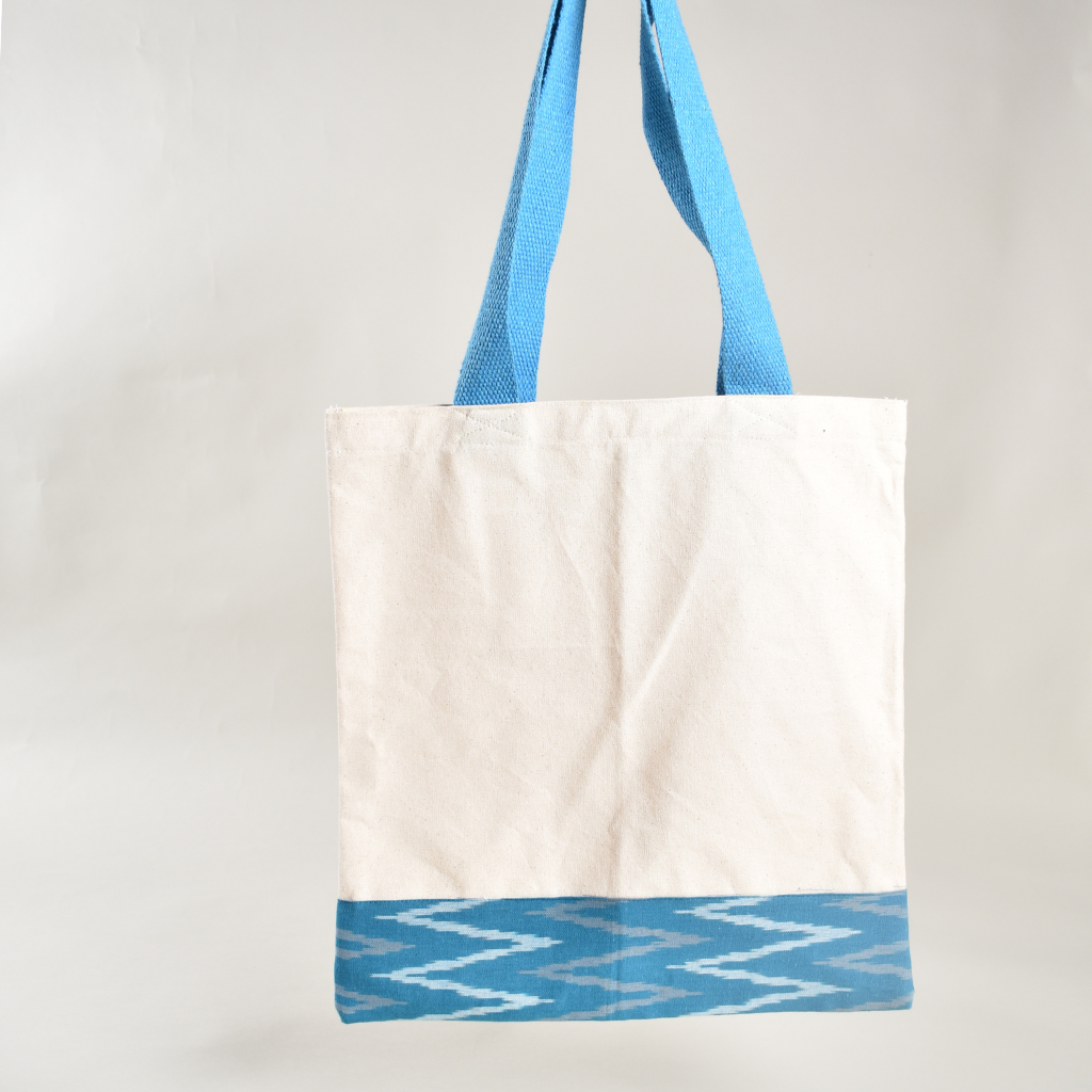 Canvas tote bag with sky blue ikat border - back