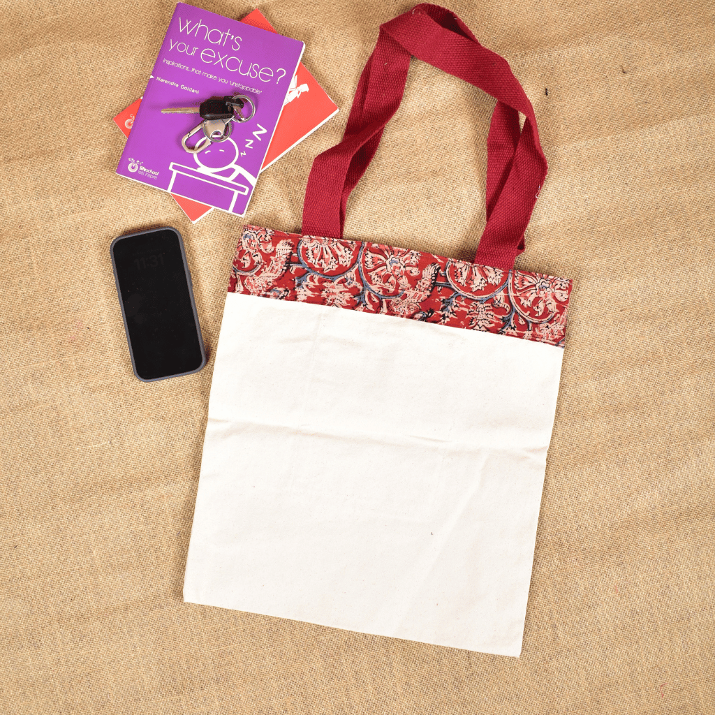 Canvas tote bag with red kalamkari border