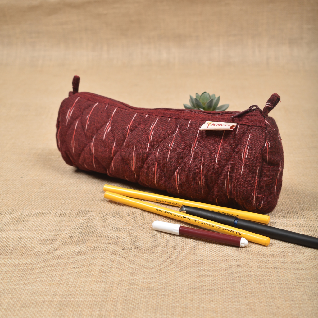 Maroon round ikat pouch - side