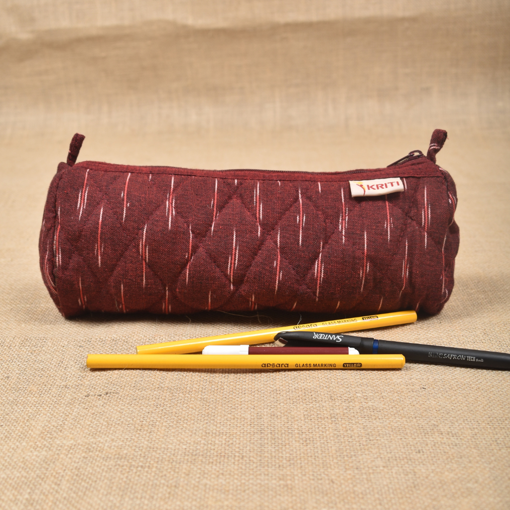 Maroon round ikat pouch - front