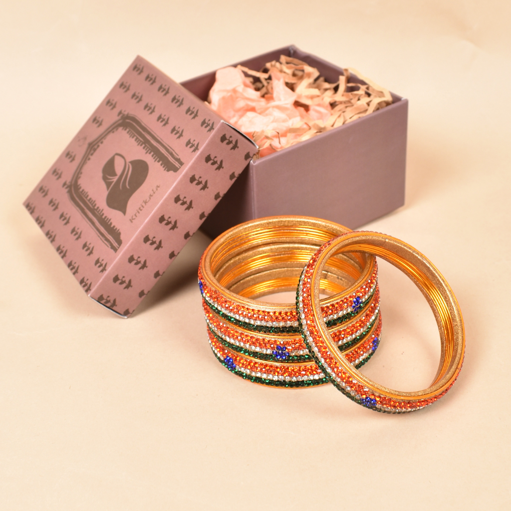 Pair of broad bangles in multicolour tones