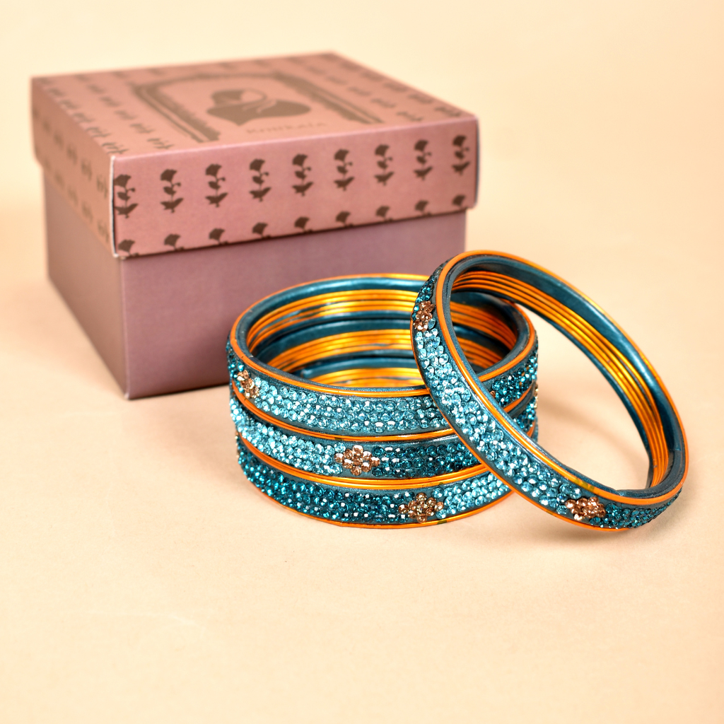 Pair of blue stone studded lac bangles