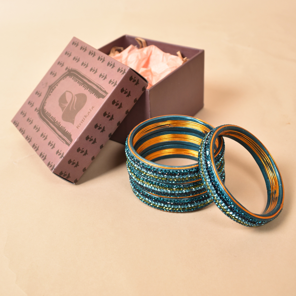 Pair of broad bangles in blue tones