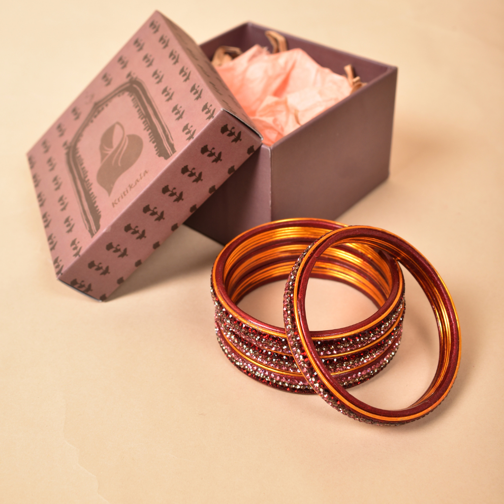 Pair of traditional lac bangles in pink and red tones