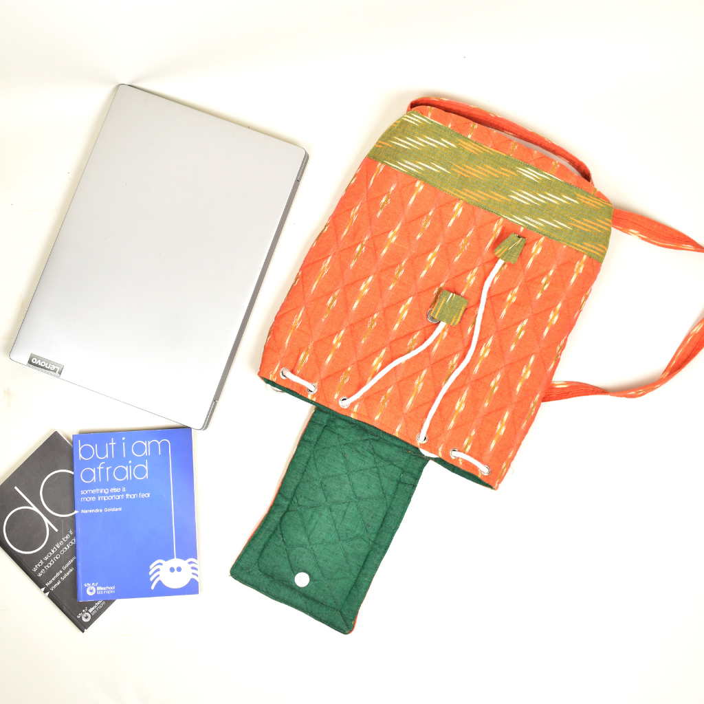 QUILTED ORANGE AND GREEN IKAT BACKPACK BAG - closure