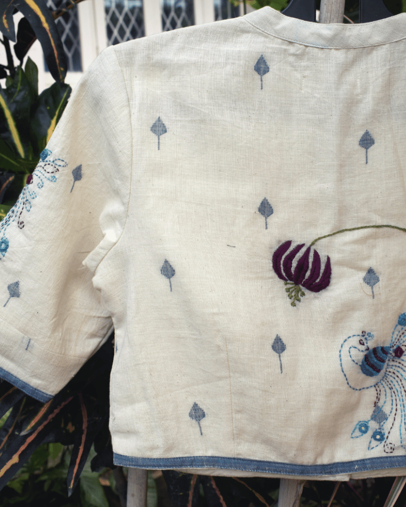 Off-white Mandarin collar embroidered blouse in khadi cotton - back