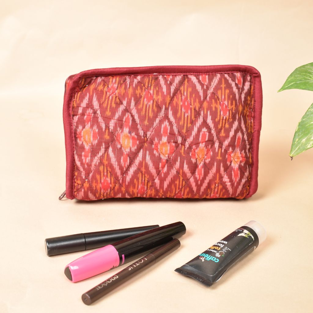 Maroon silk ikat jewellery pouch with 4 zips - front