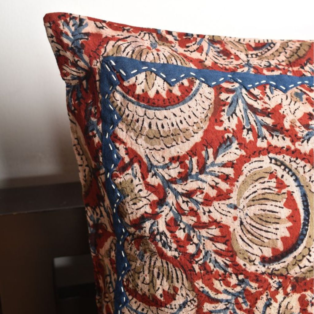 Red Kalamkari cushion cover with applique