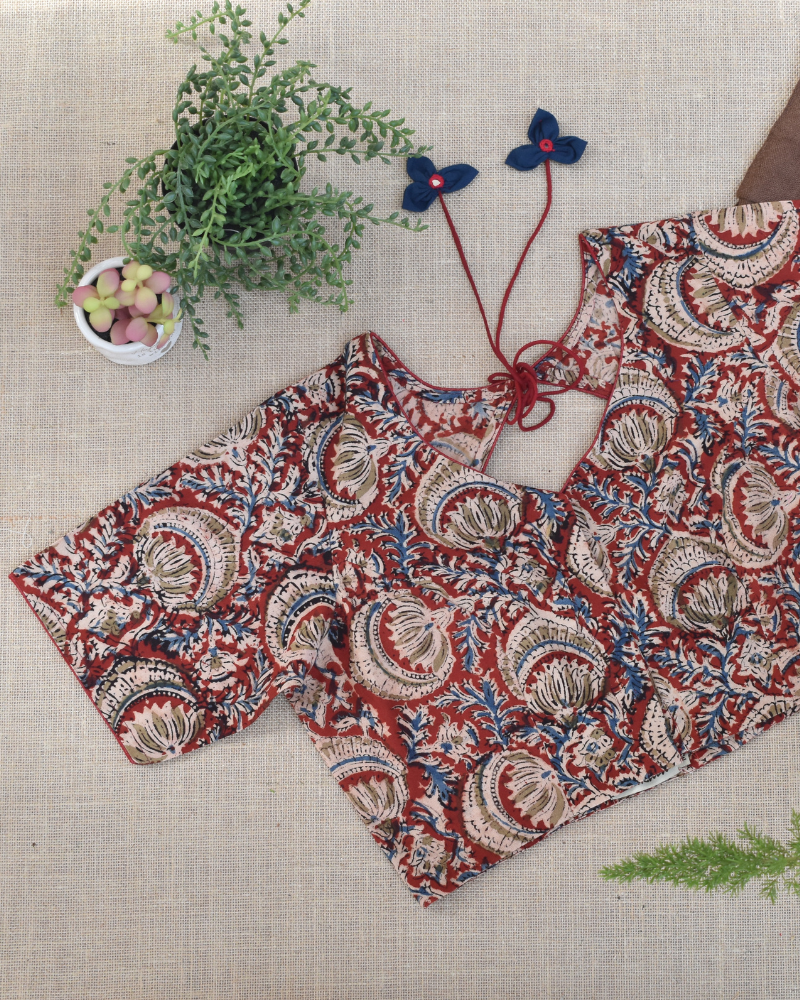 Red kalamkari blouse with flower tassels - front