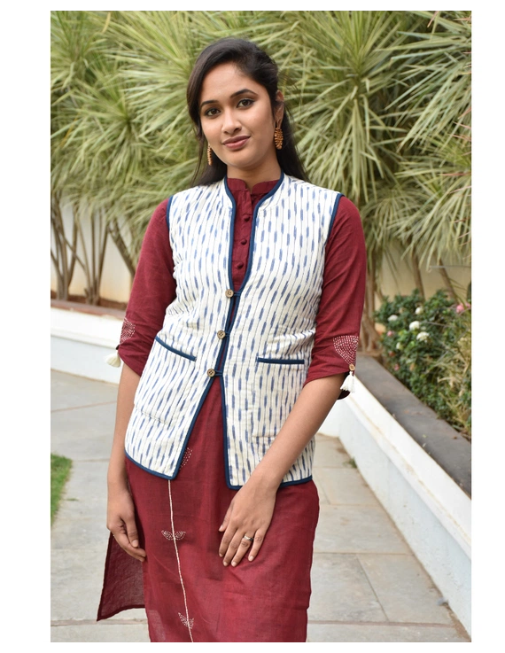Reversible quilted jacket in blue and white ikat - front