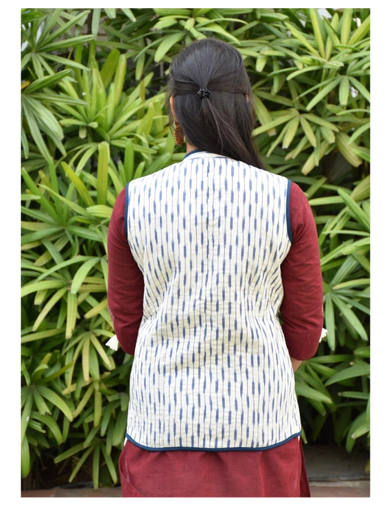 Reversible quilted jacket in blue and white ikat - back