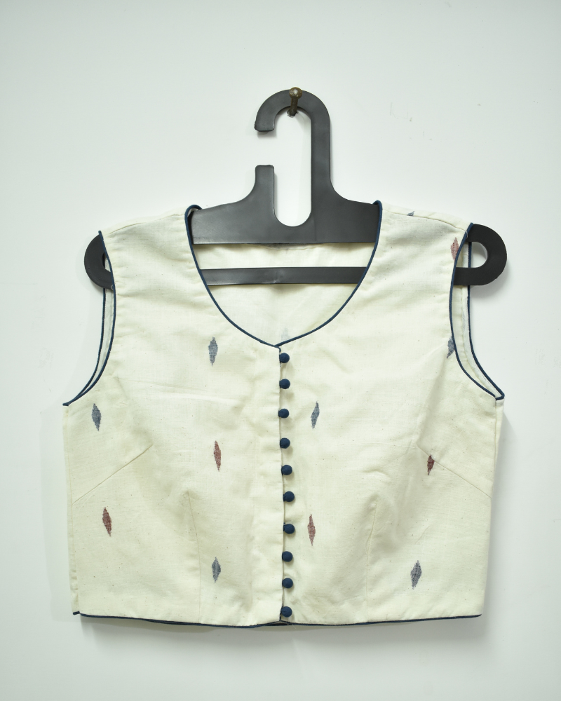 Off-white saree blouse with orange flower motif - front