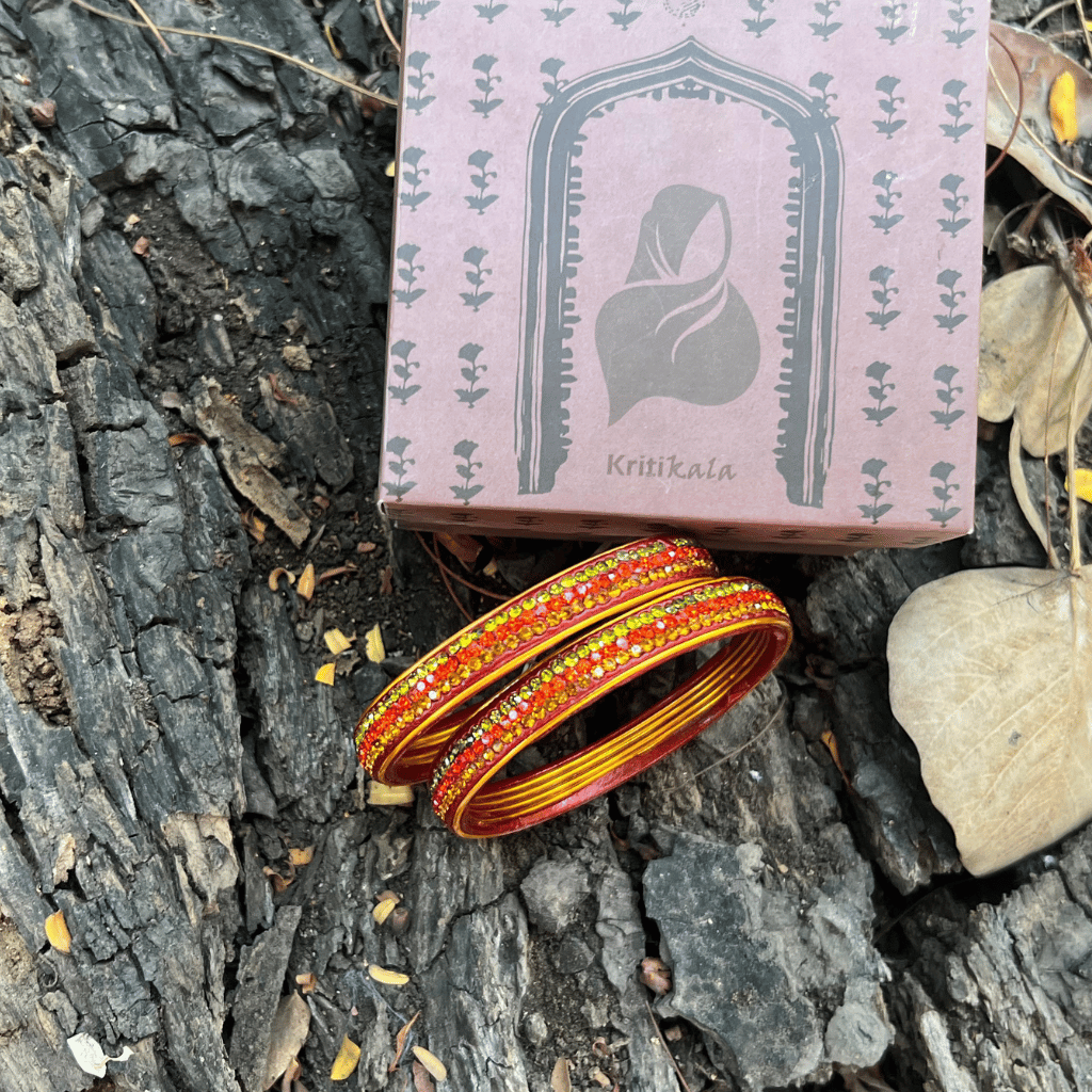 Pair of traditional lac bangles in pink and gold tones