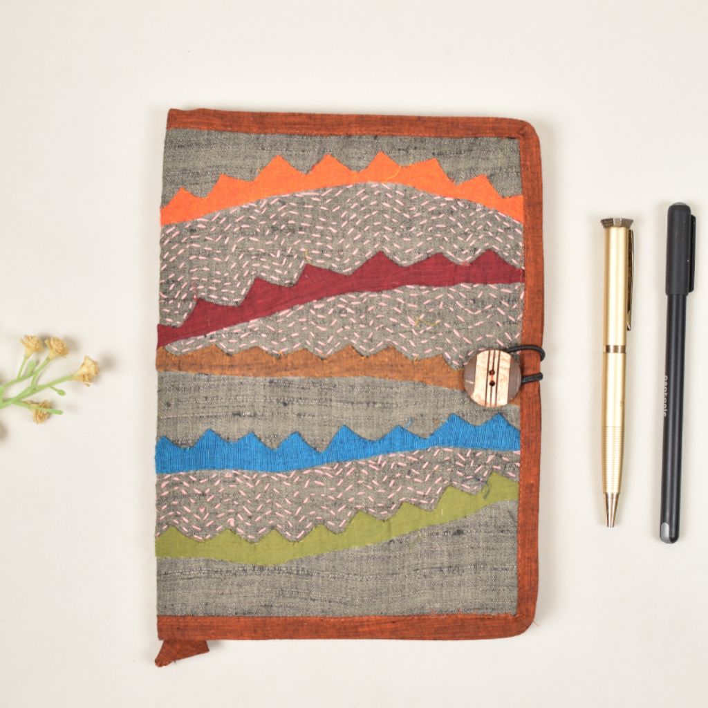 Brown embroidered diary sleeve with hand made paper notebook - front