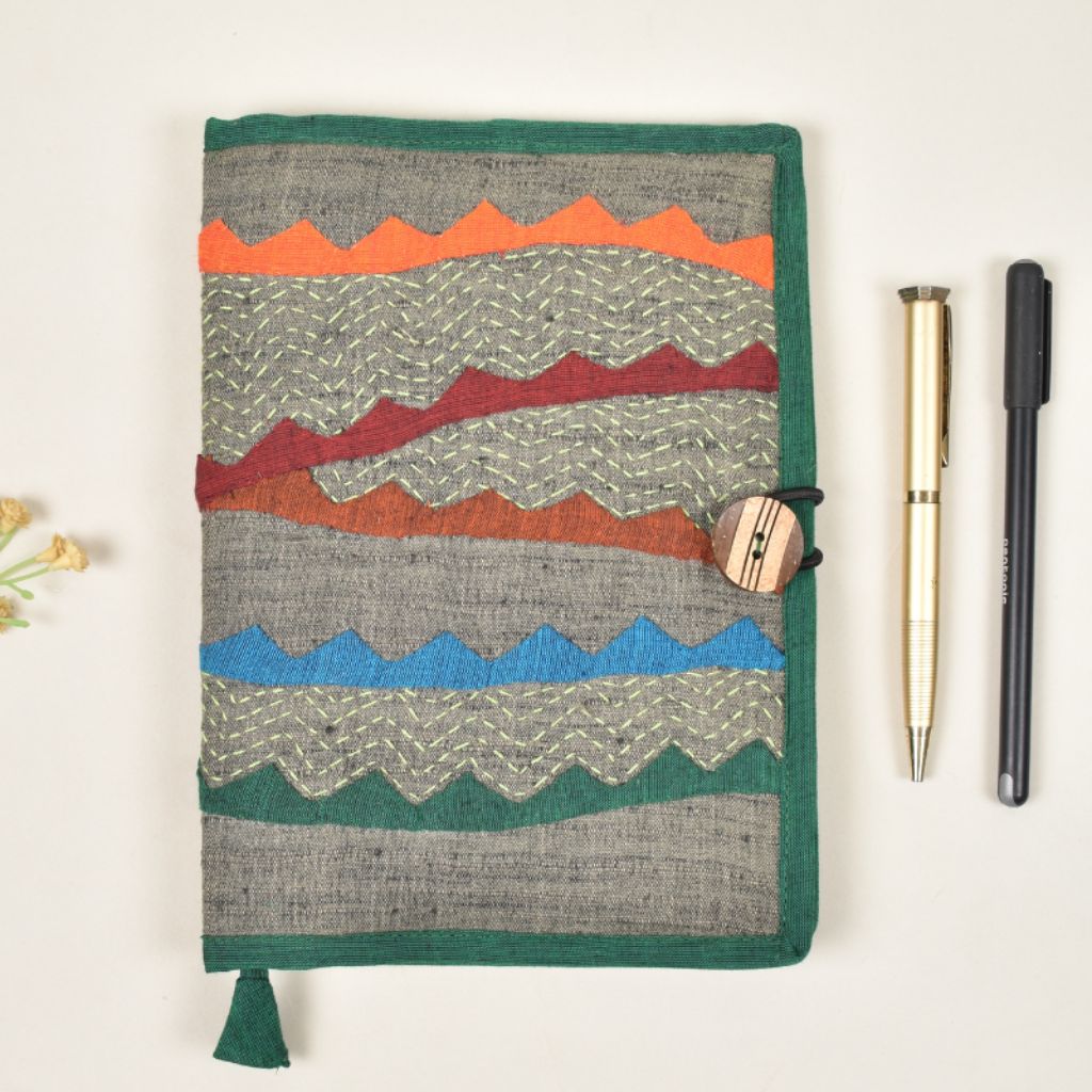 Green embroidered diary sleeve with hand made paper notebook - front