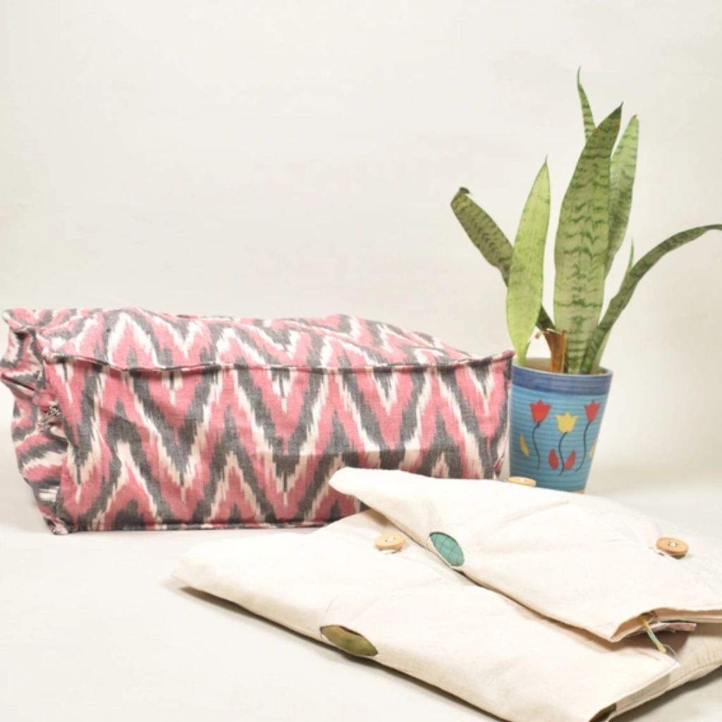 Pink ikat garment organiser with set of 10 saree sleeves