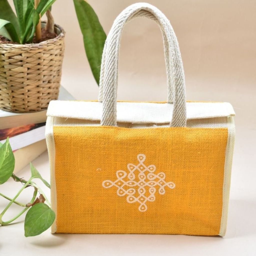 Yellow and white jute lunch bag with traditional motif - handle
