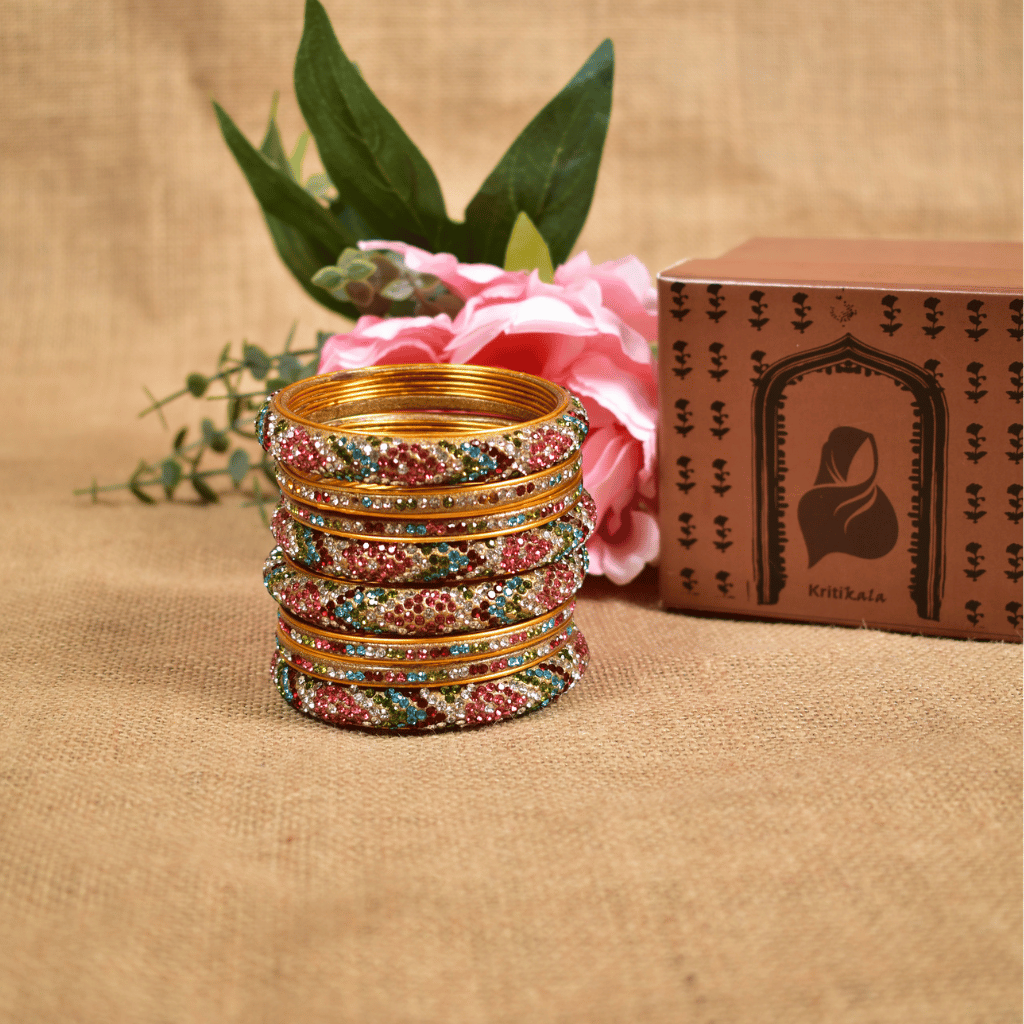 Set of eight bangles in pink & white tones