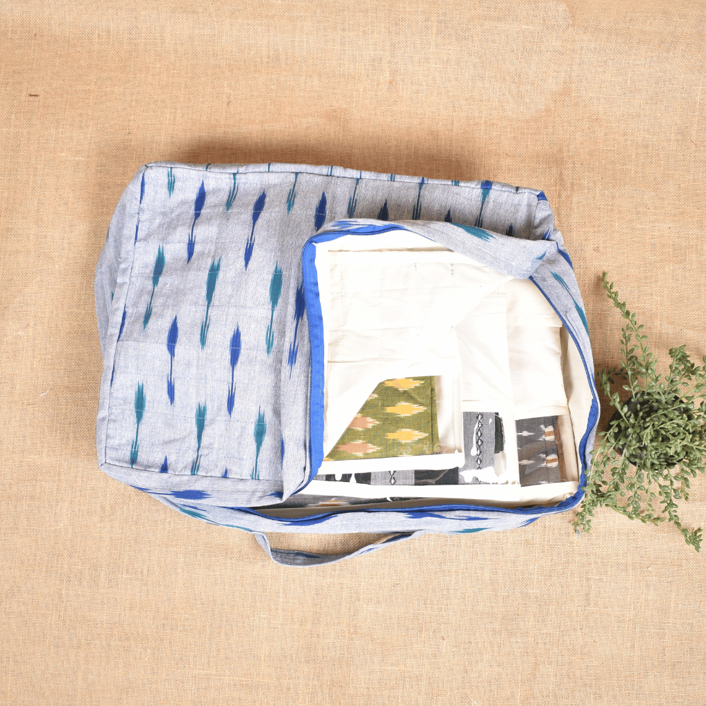 Blue ikat sarees storage bag with sleeves 
