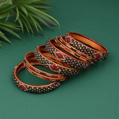 Set of  eight bangles in green & maroon tones - women