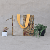 Yellow kalamkari and jute lunch bag
