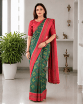 Green ikat saree with hand embroidery