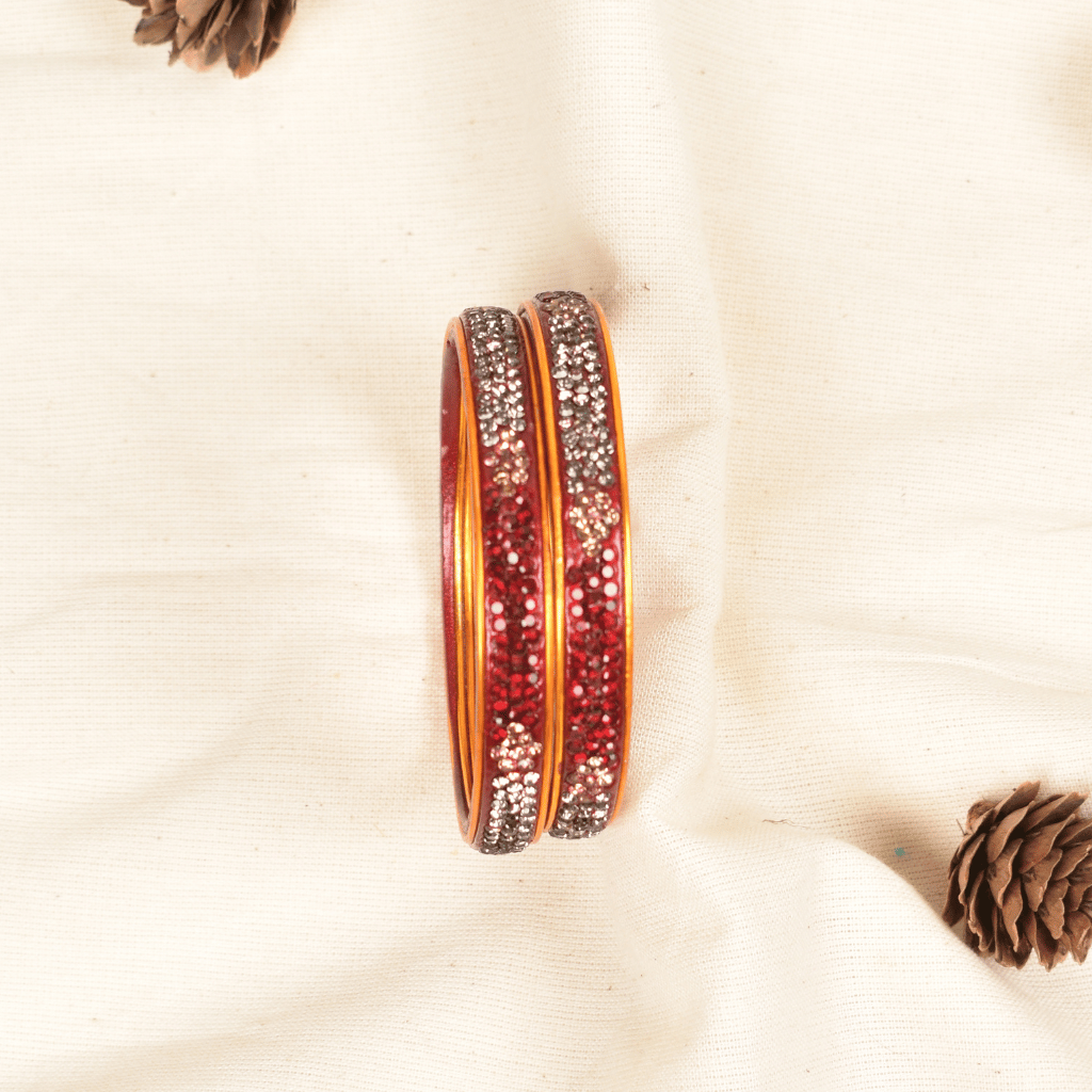 Pair of red & black 3 line stoned lac bangles