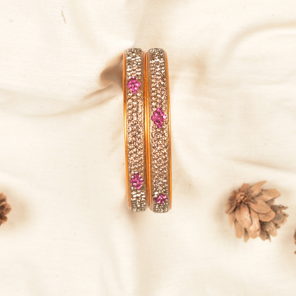 Pair of golden 3 line stoned lac bangles