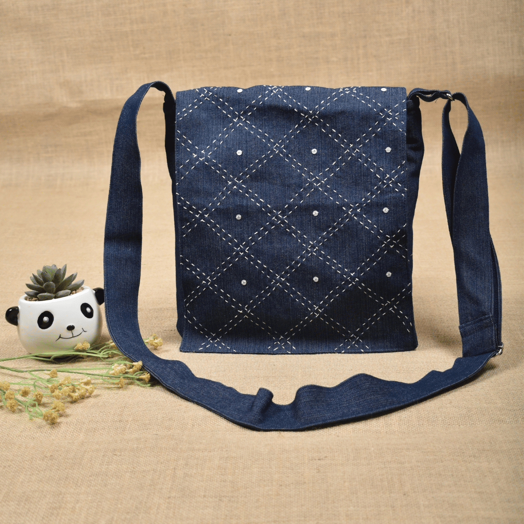 Denim sling bag with embroidery - front
