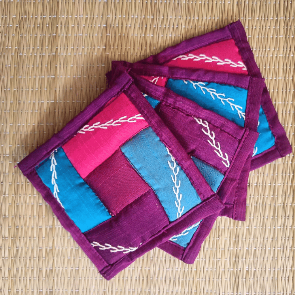 Set of 4 embroidered fabric coasters in blue & maroon