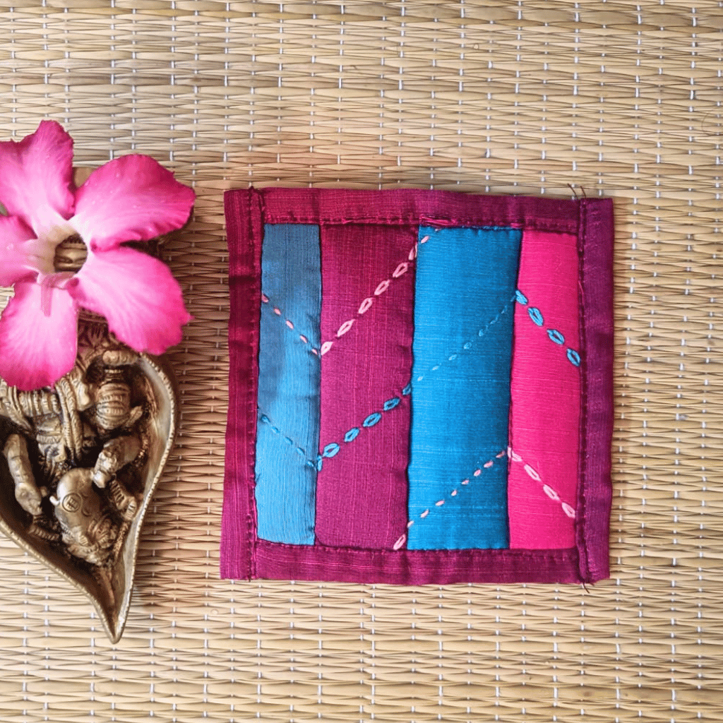 Handmade patchwork embroidered coaster in vibrant festive colors
