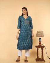 A symmetric Teal Blue Ikat Embroidery Kurta - front