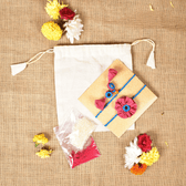 Handcrafted Bhai Bhabhi Flower Rakhi Set with Cotton Potli, Kumkum & Rice - Pink