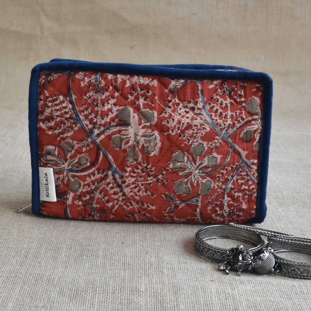 Rust kalamkari jewellery case with 4 zip pockets