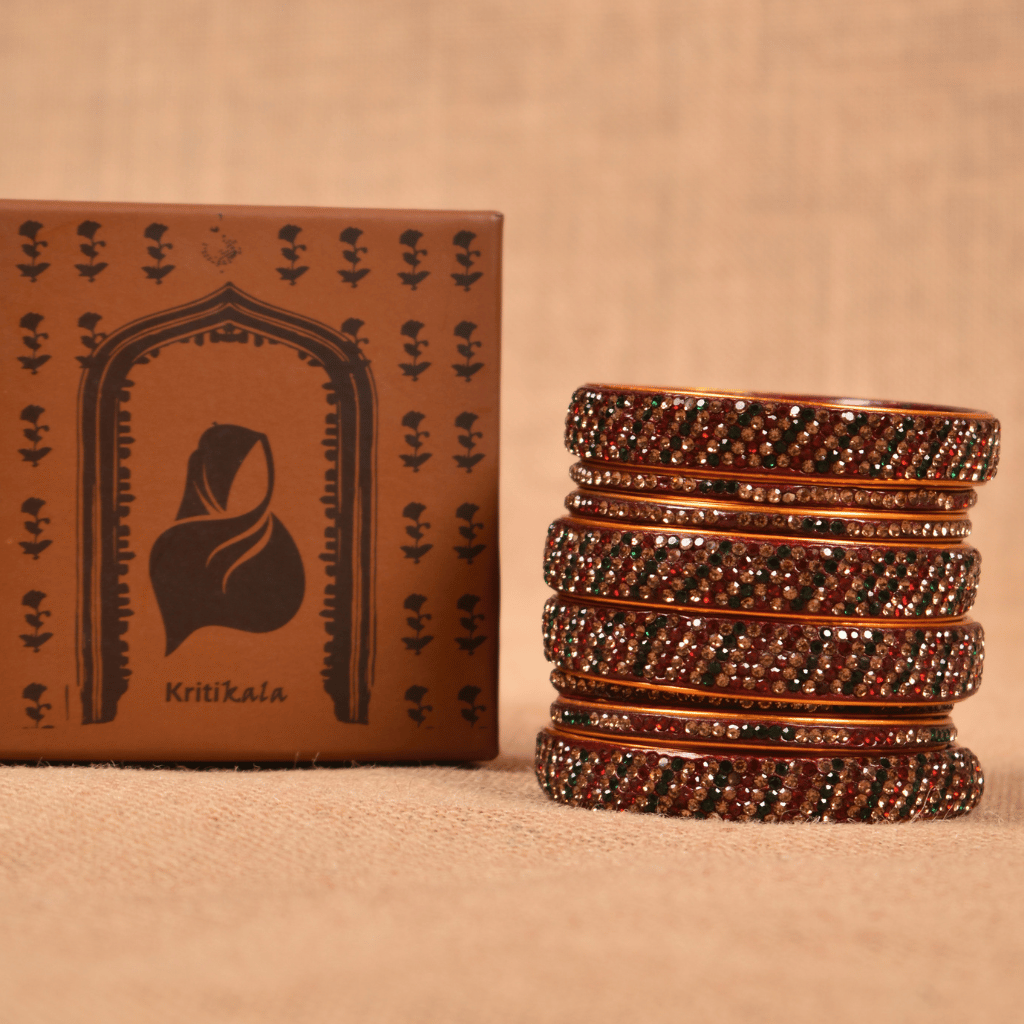 Set of  eight bangles in green & red tones