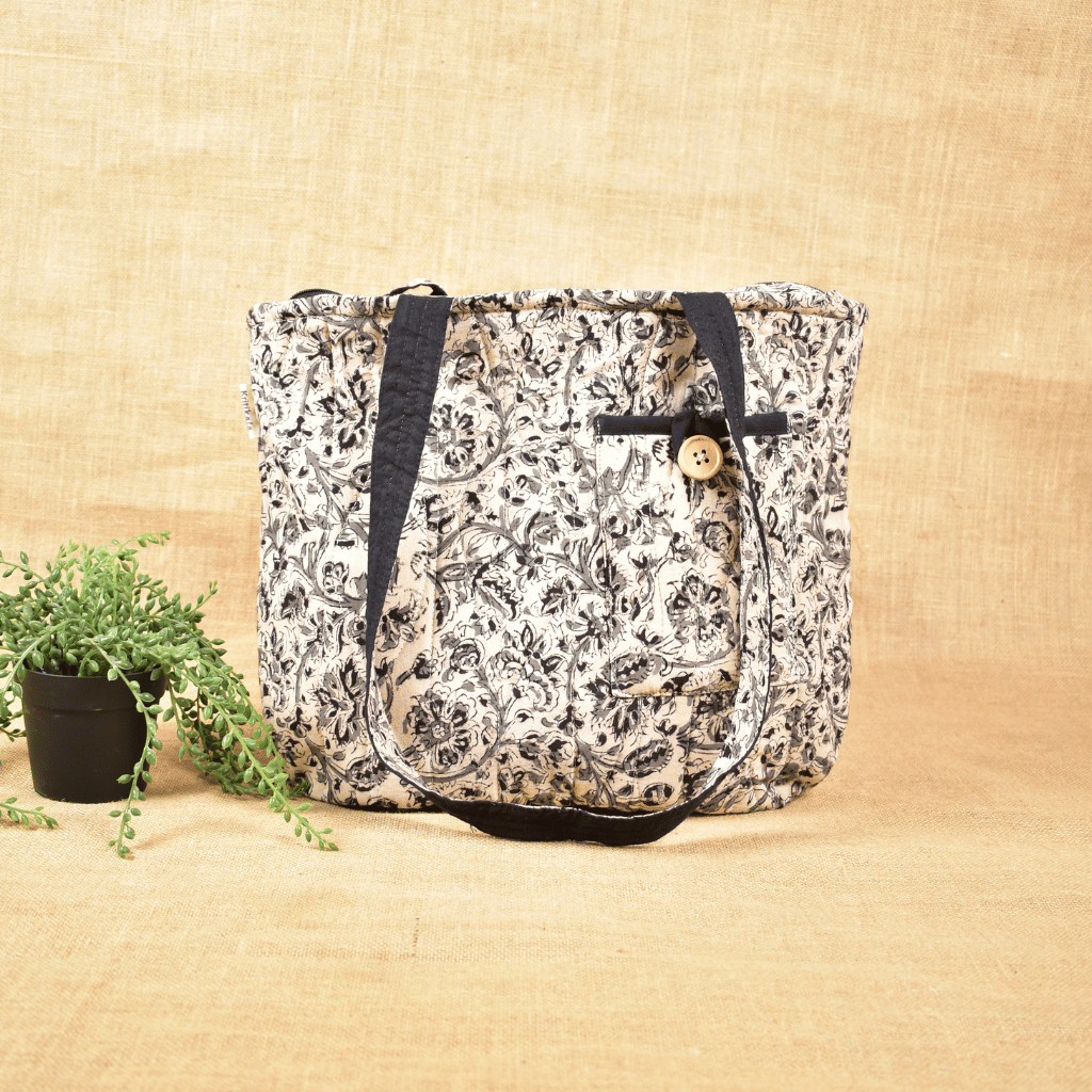 Black kalamkari quilted flat bag - Front