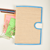 Simple natural jute file folder with a velcro tab and blue piping - front