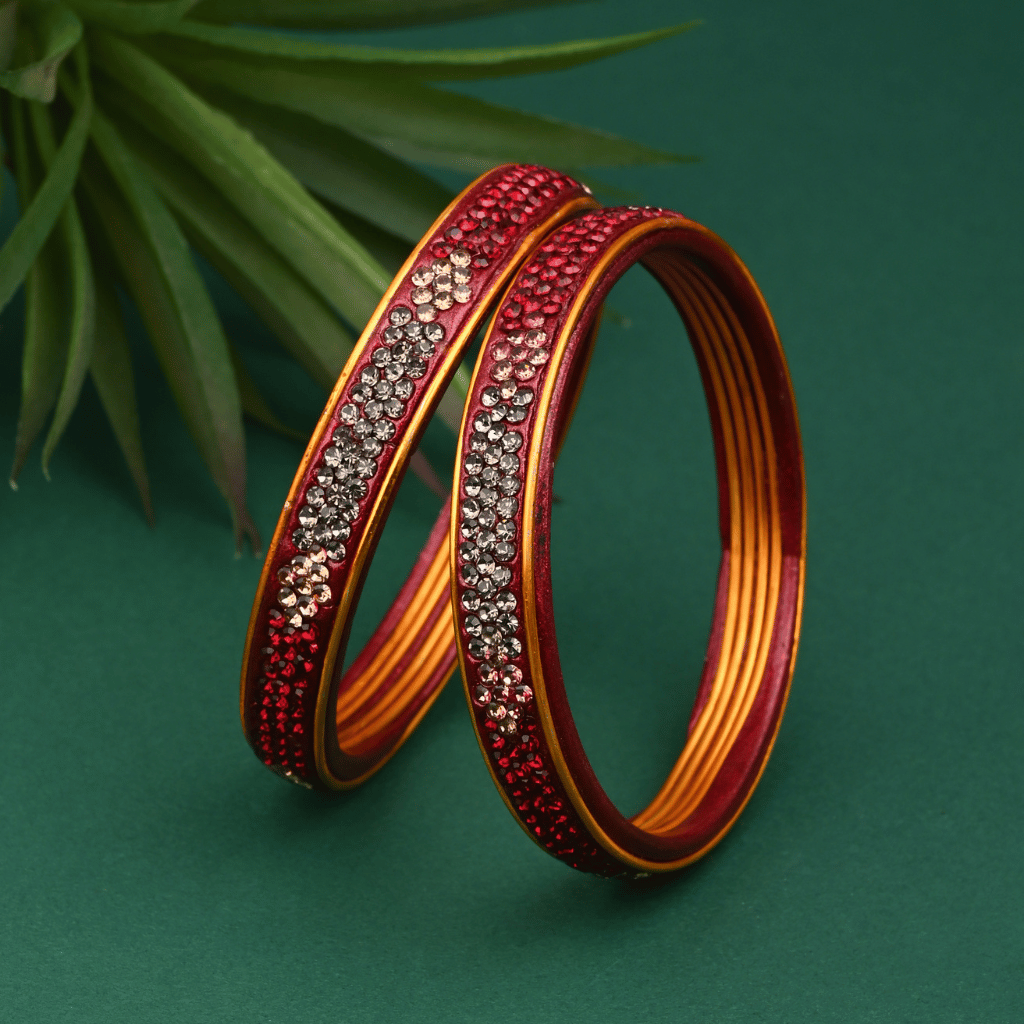 Pair of festive bangles in red and black tones - lac