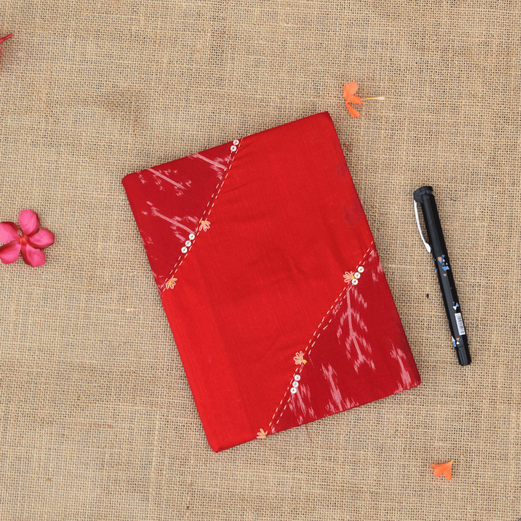 Kritikala handmade paper diary with Mangalagiri and Ikat embroidered cover.