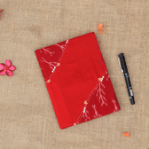 Kritikala handmade paper diary with Mangalagiri and Ikat embroidered cover.