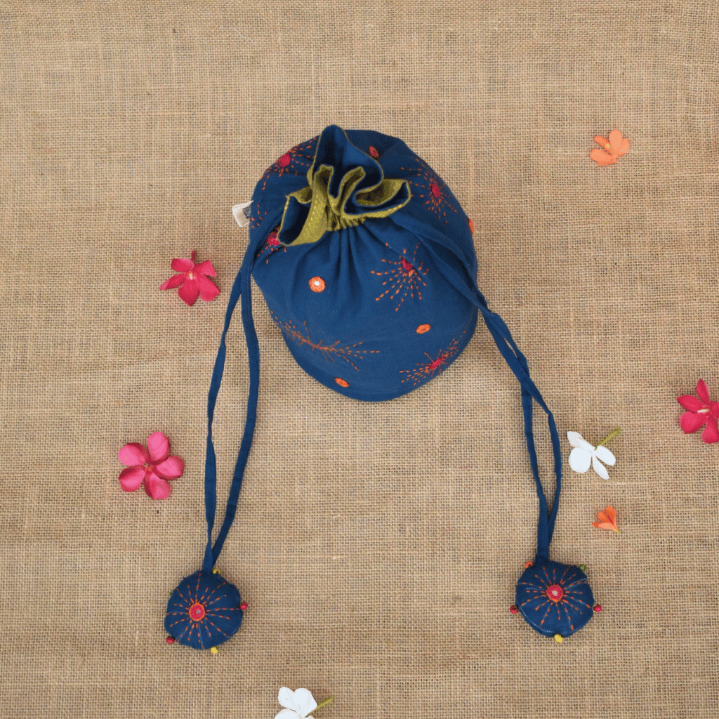 Handmade potli with tassels in Mangalagiri cotton