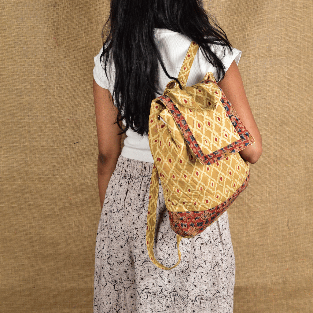 Quilted Yellow Kalamkari Backpack Bag- model