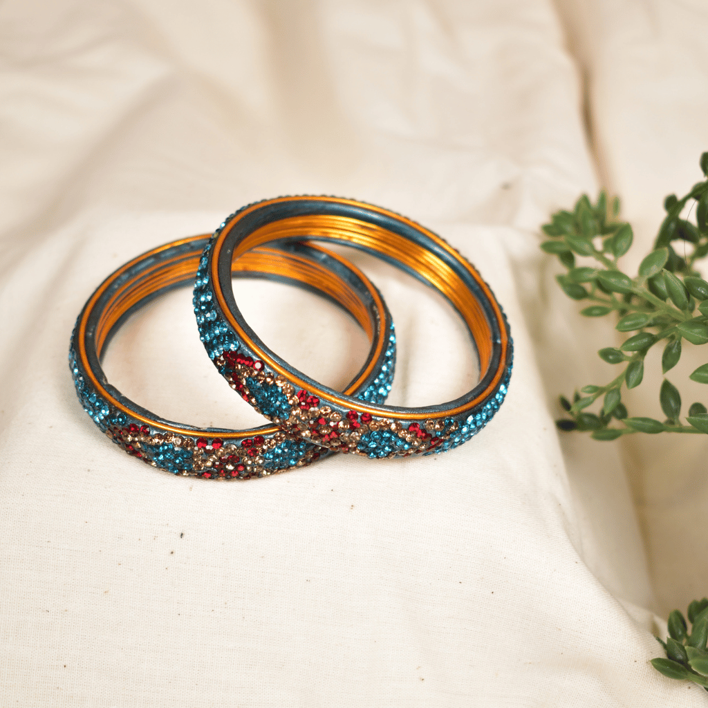 Pair of broad bangles in blue and maroon tones
