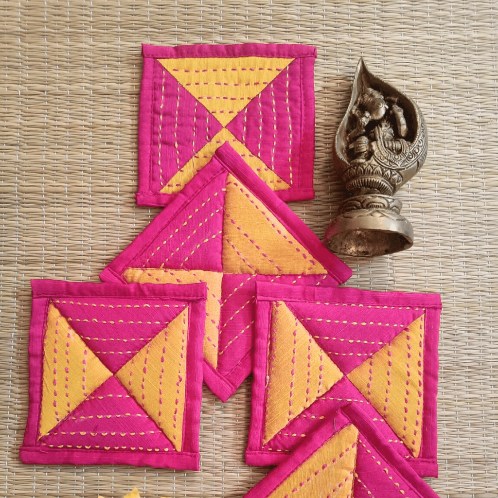Set of 4 colorful embroidered coasters in festive design
