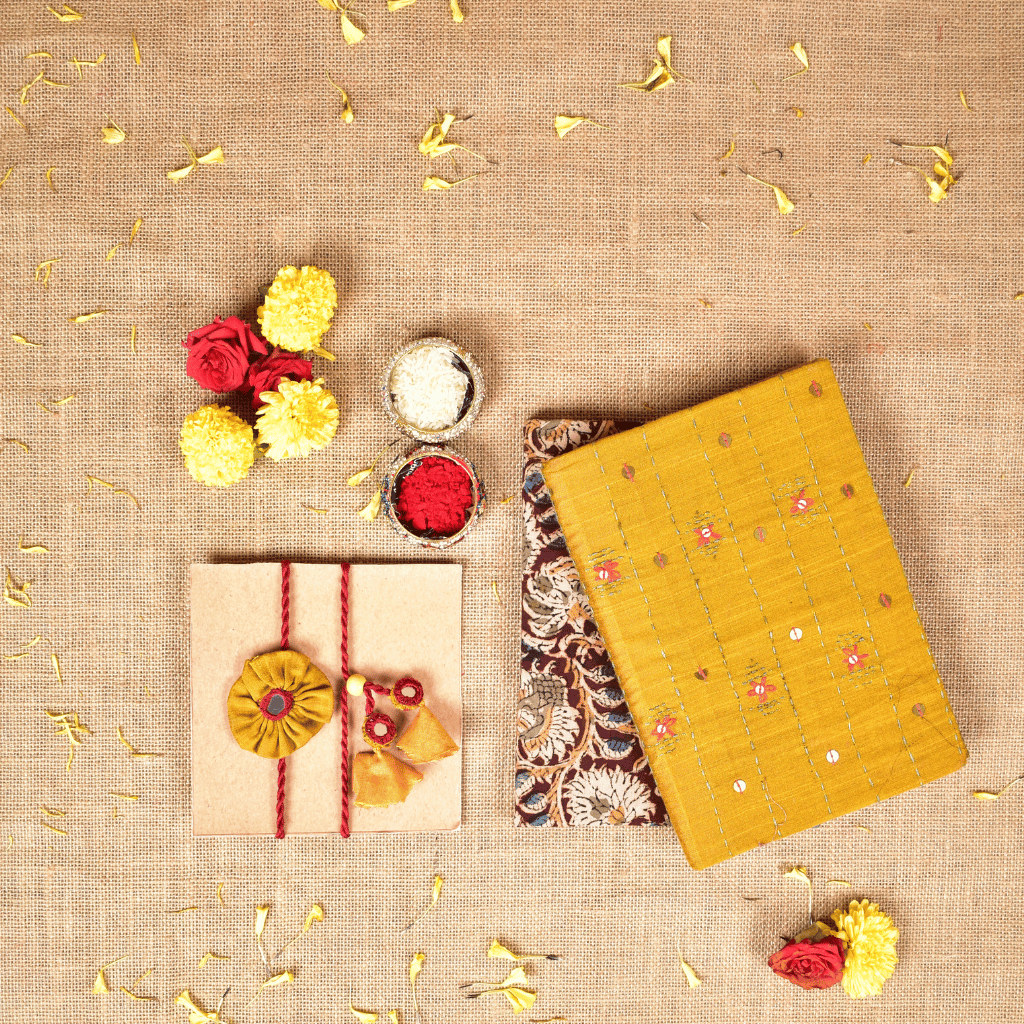 Bhai Bhabhi Raksha Bandhan Gift Combo – Rakhi Set with Handloom Diaries