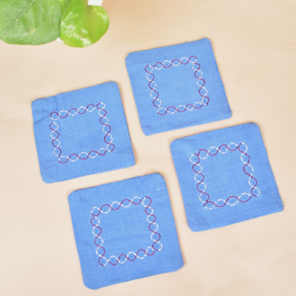 Blue cotton embroidered table coasters