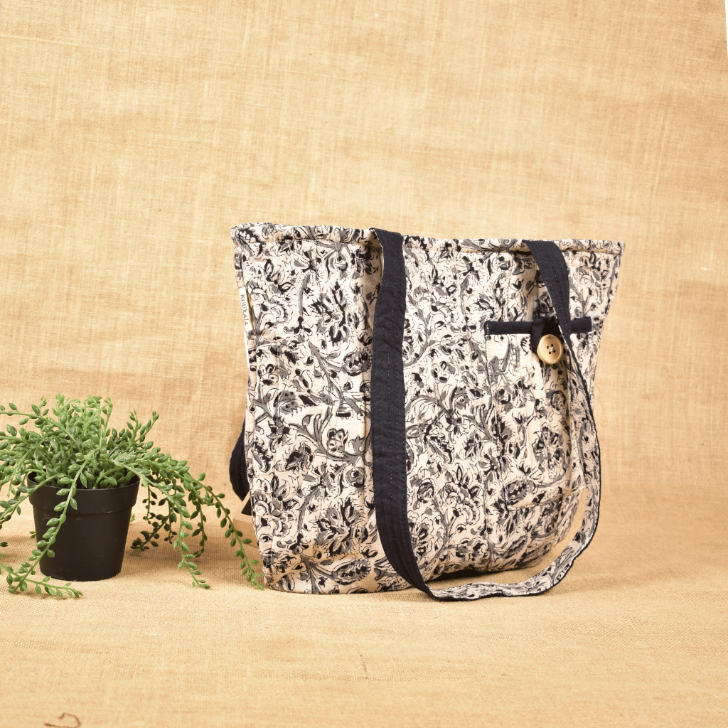 Black kalamkari quilted flat bag - side