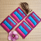 Set of 4 colorful patchwork fabric coasters with embroidery