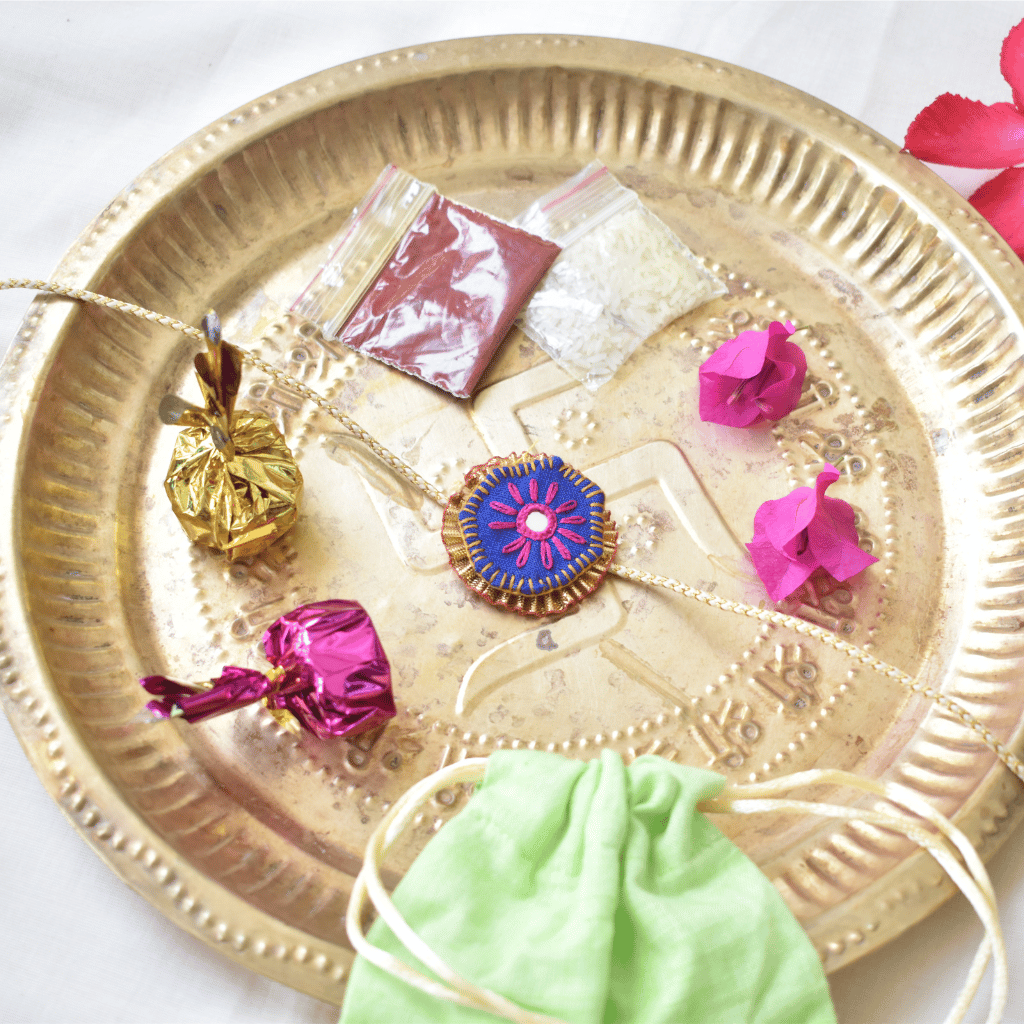 Blue Round Embroidery Handloom Rakhi