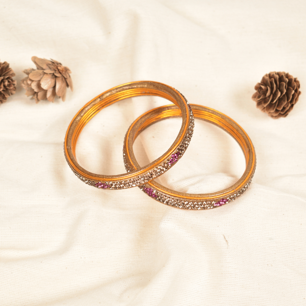 Pair of golden 3 line stoned lac bangles - glittery stones